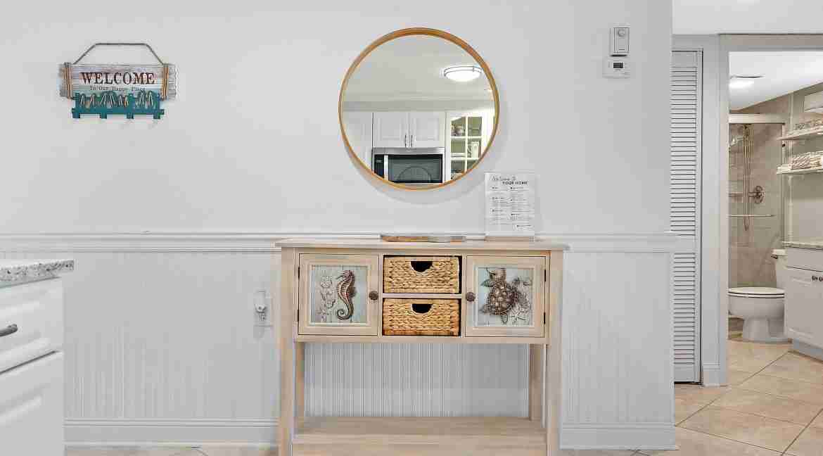 Welcoming-Foyer-Coastal-Decor-Hutchinson-Island-Condo.jpg